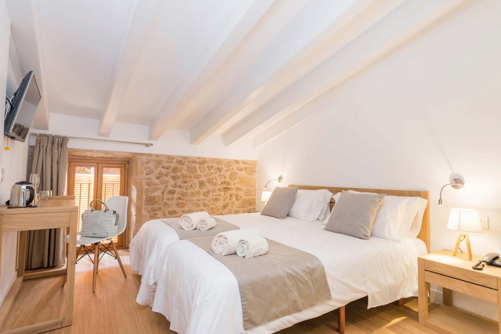 Gorgeous light and chic bedrooms at Can Mostatxins - Boutique Hotels Mallorca